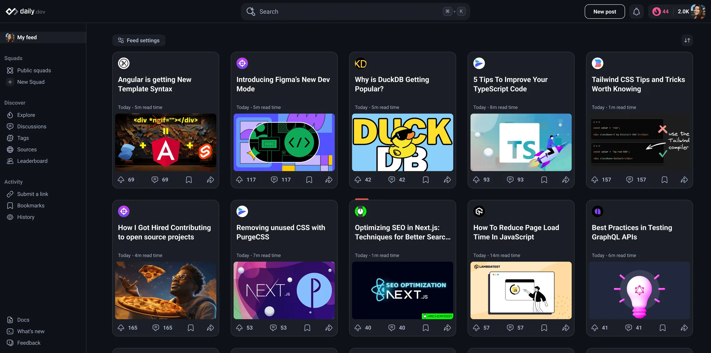 The daily.dev app: a sidebar of feeds beside a grid of developer news article cards.